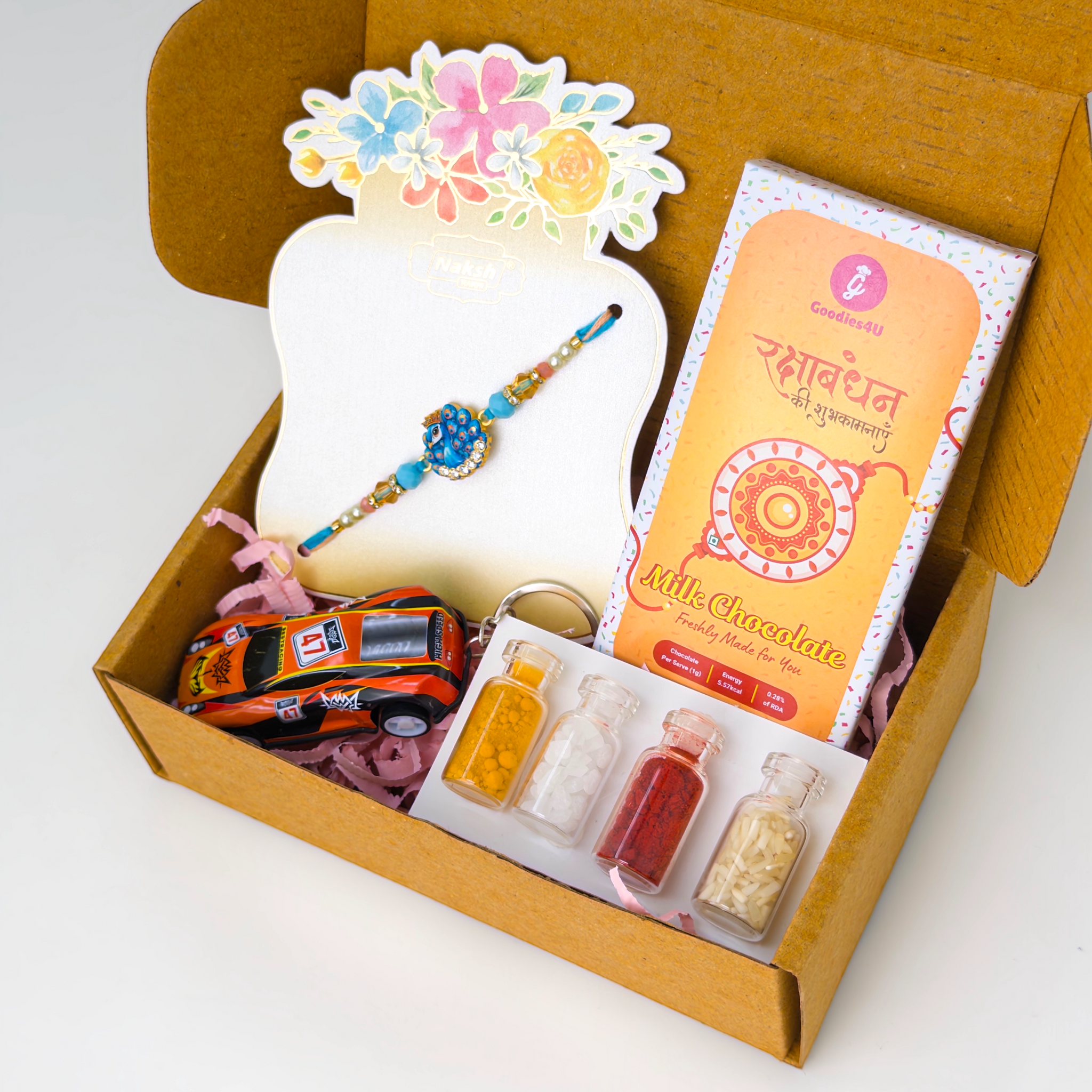 Blue Peacock Rakhi Hamper – From Sister to Brother