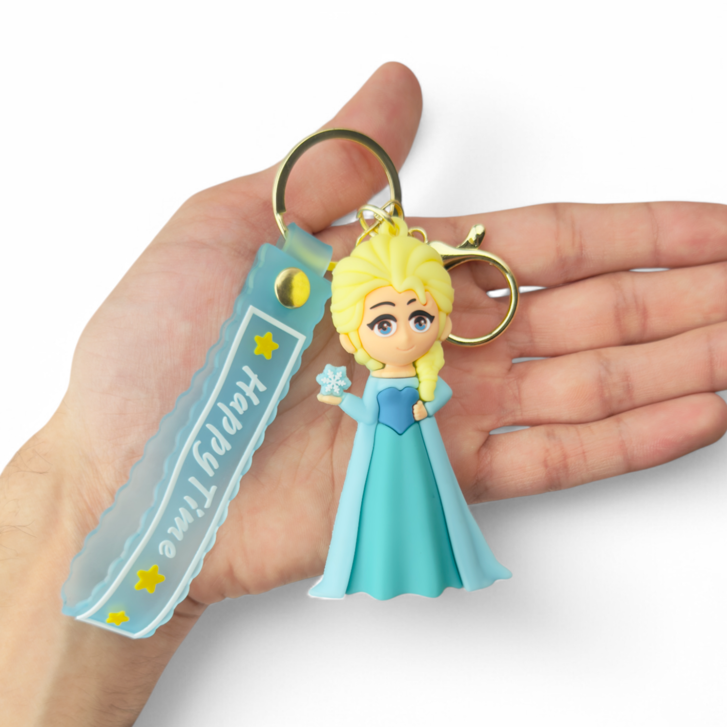 Cartoon Elsa in blue dress holding a snowflake keychain